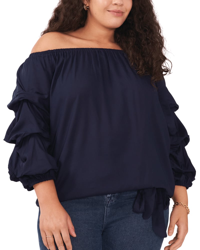 Front of a model wearing a size 1X Taytum Off The Shoulder Blouse in CLASSIC NAVY by Vince Camuto. | dia_product_style_image_id:261308